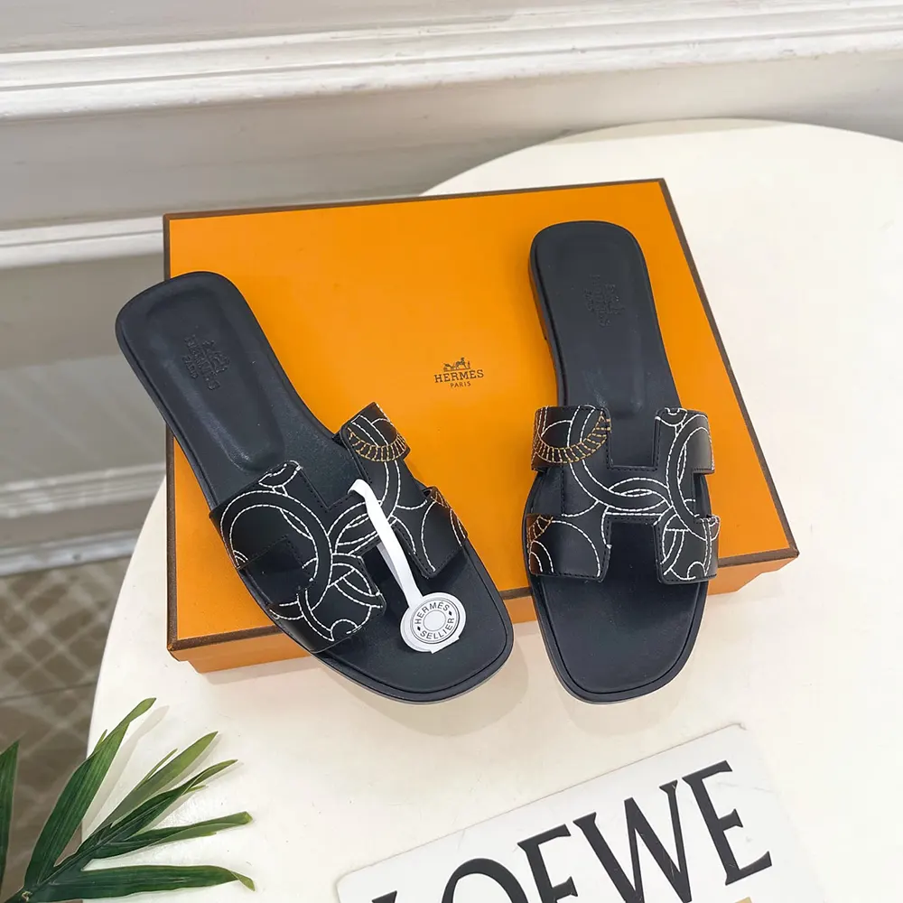 Top view detailing embroidered calfskin on Hermes Women Oran sandal