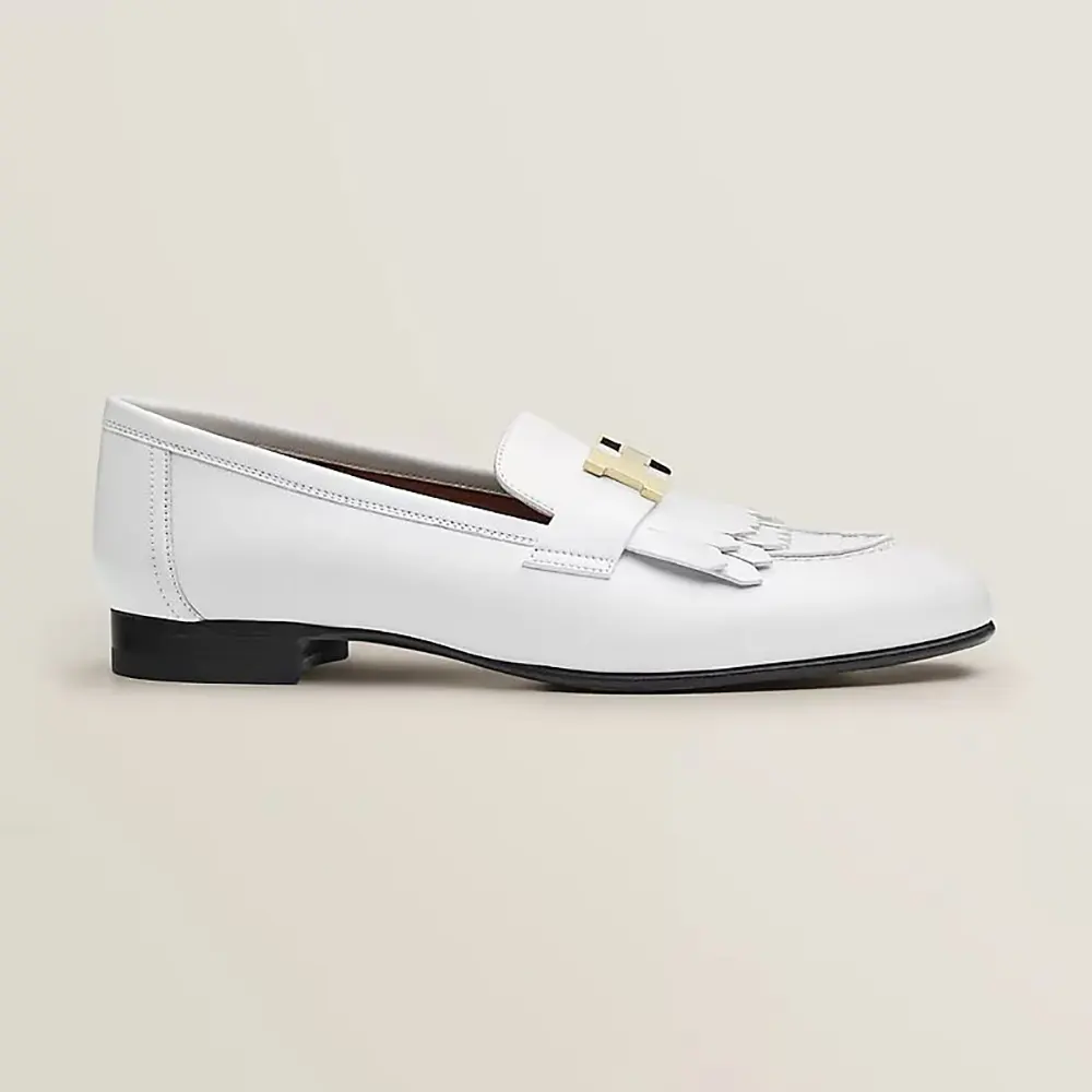 Side view of Hermes Women Royal loafer in Calfskin-White showing silhouette