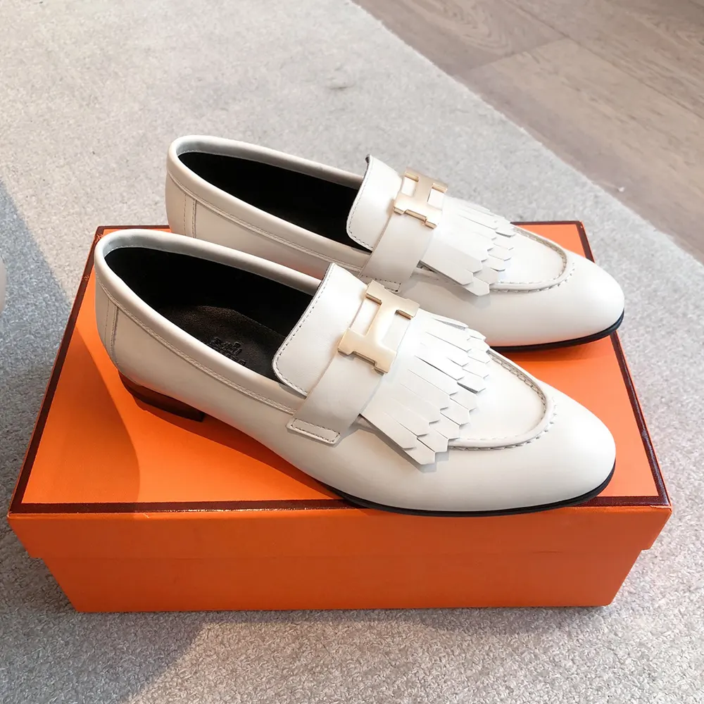 Top-down look at signature hardware on Hermes Women Royal loafer