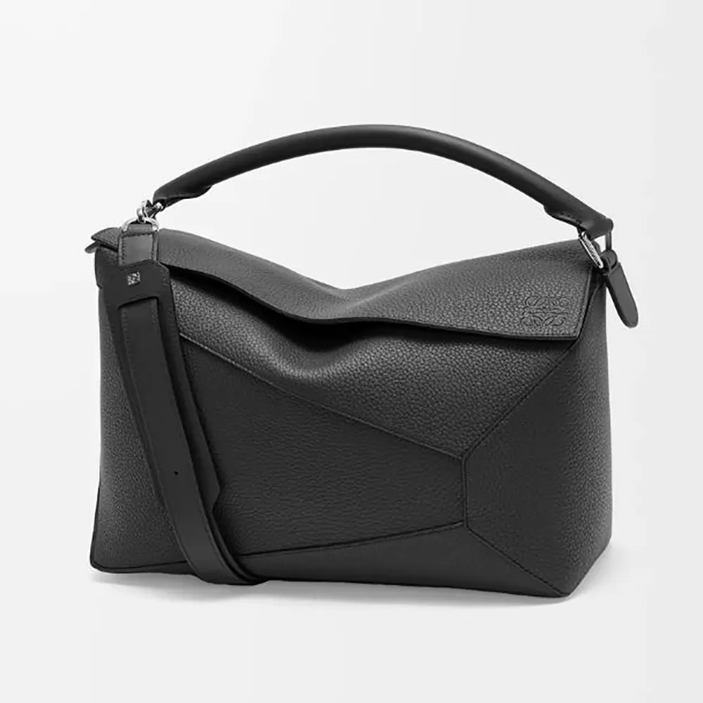 Front angle view of Loewe Unisex Large Puzzle Edge Bag in black calfskin