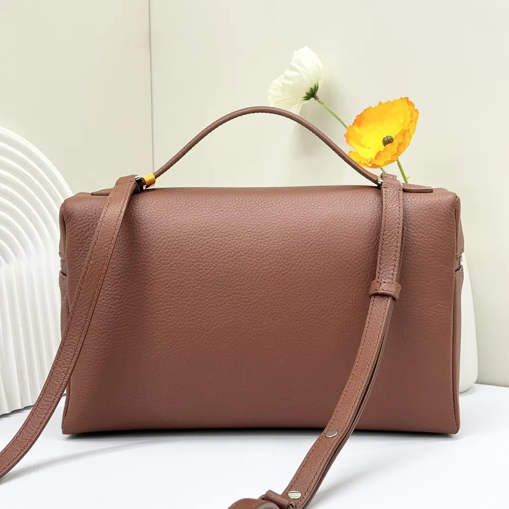 Side angle showing the slim silhouette of Loro Piana Women Extra Pocket L27-Brown