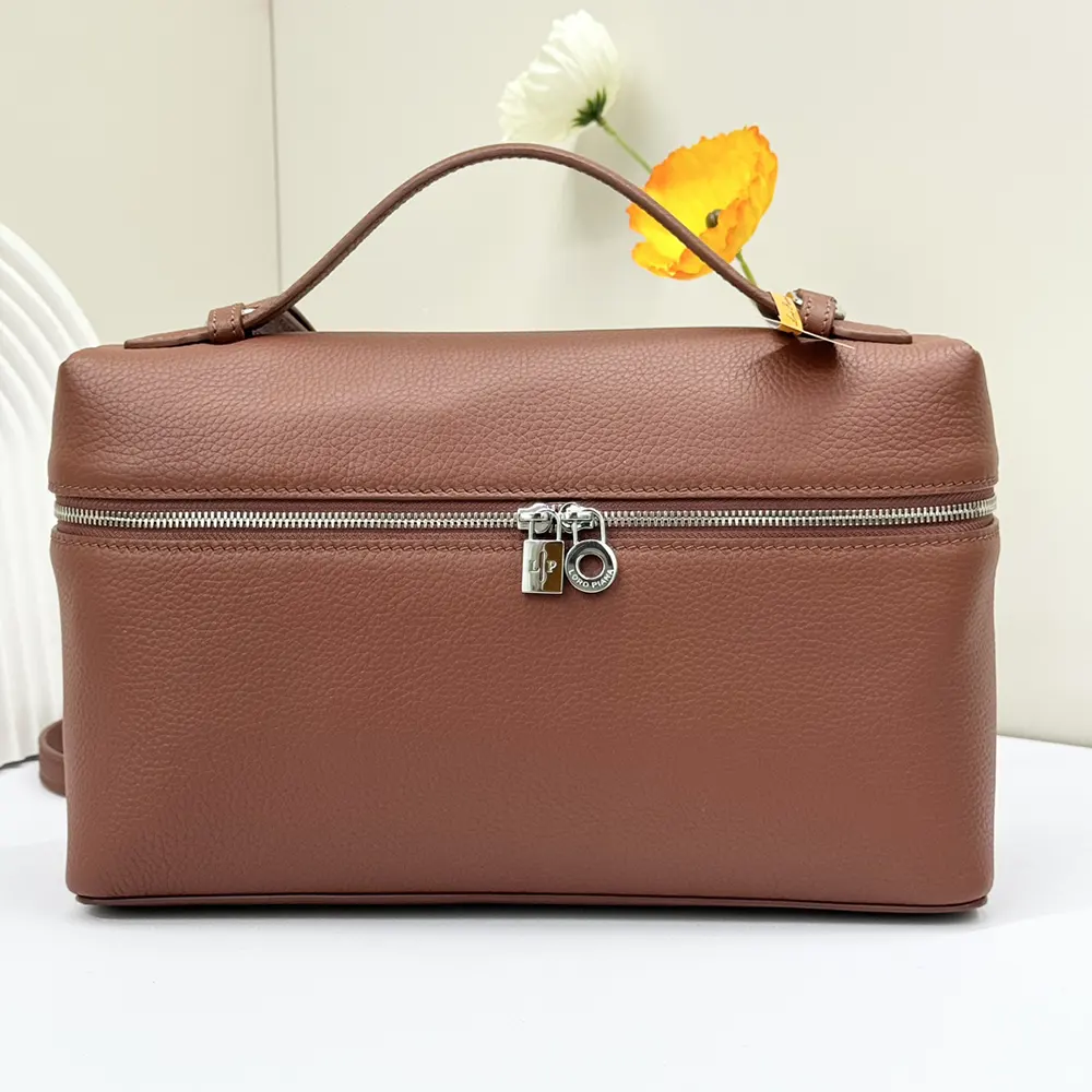 Close-up of gold hardware detail on Loro Piana Women Extra Pocket L27-Brown