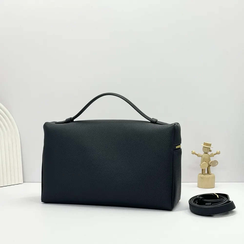 Side angle showing the bag's extra pocket and flap closure