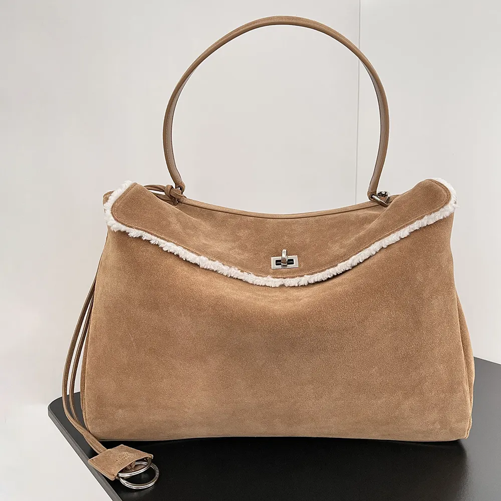 Close-up of antique brass hardware on Balenciaga Women Rodeo Handbag Medium
