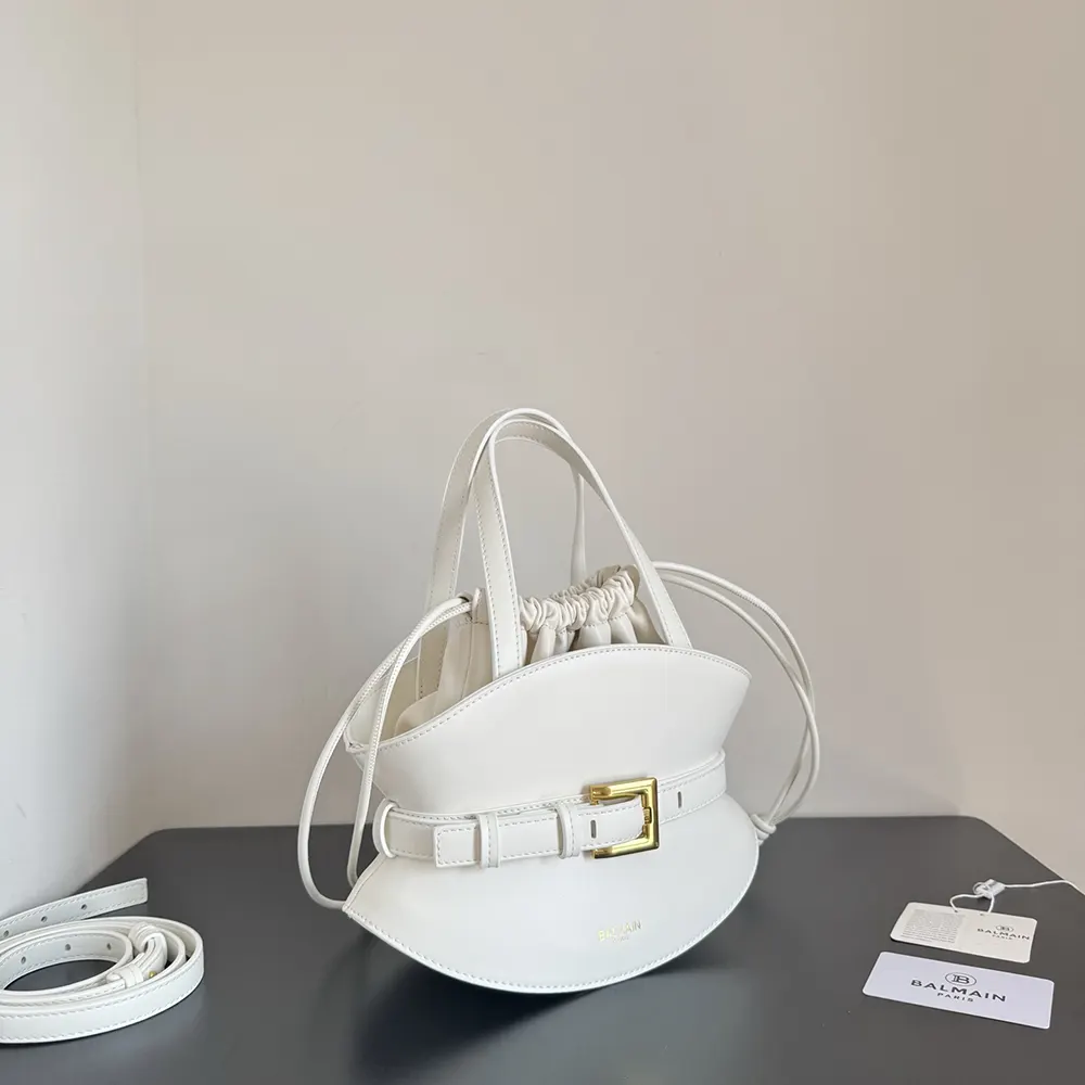 Side profile of Balmain Women Shuffle Mini Bag in smooth white calfskin