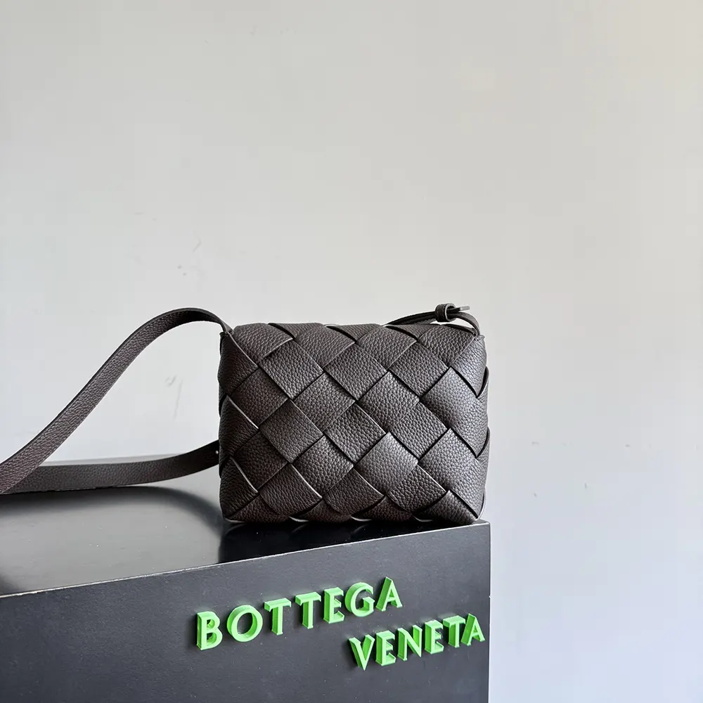 Side profile showing matte gold hardware on Bottega Veneta Diago-Bordeaux