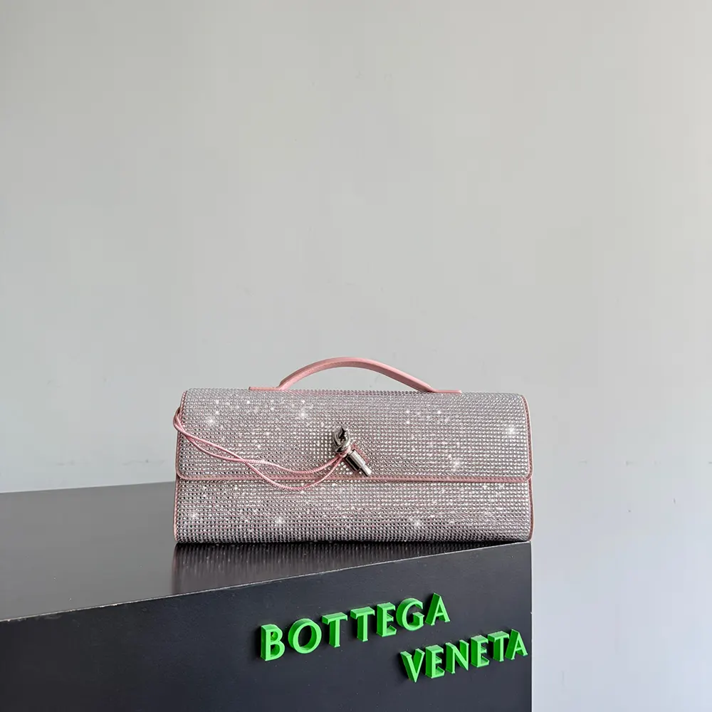 Close-up of rose intrecciato leather and gold hardware detail