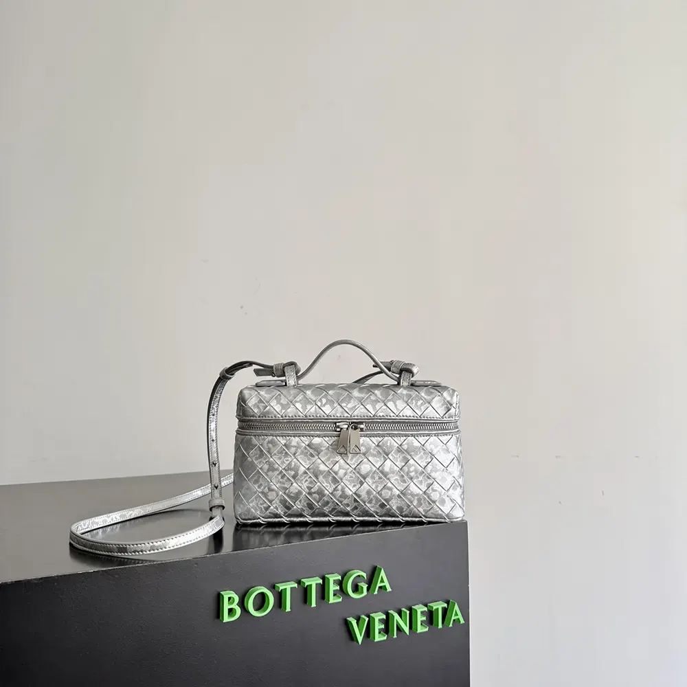 Close-up on signature intrecciato weave and silver hardware details