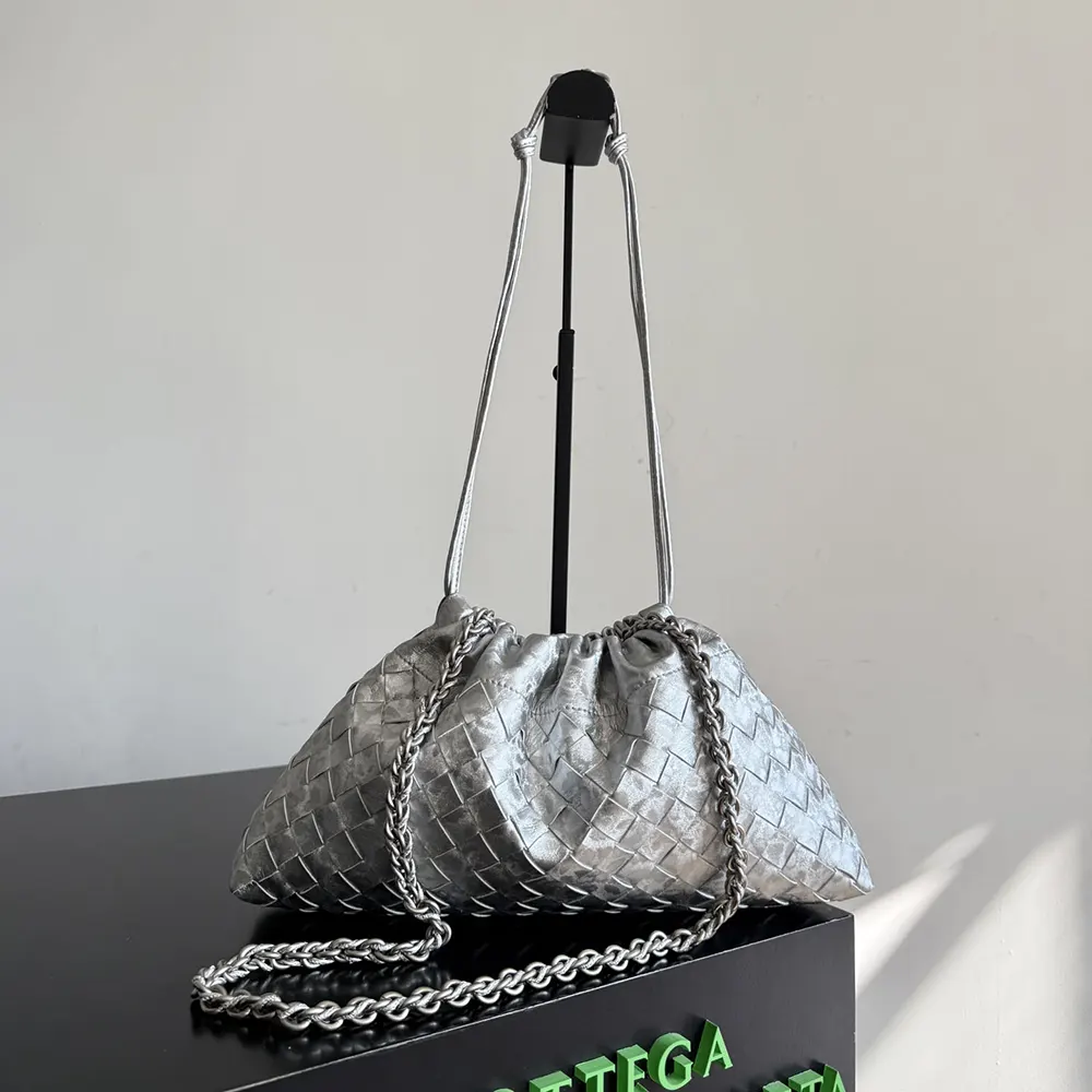Close-up of silver intrecciato leather detail on Dustbag Notte-Silver