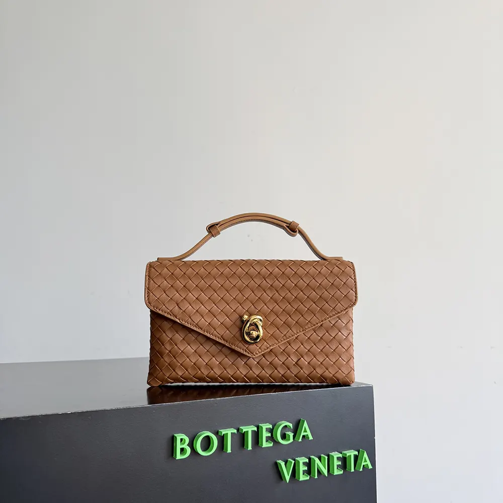 Side angle showing silhouette of Bottega Veneta Women Knot Lock-Brown handbag