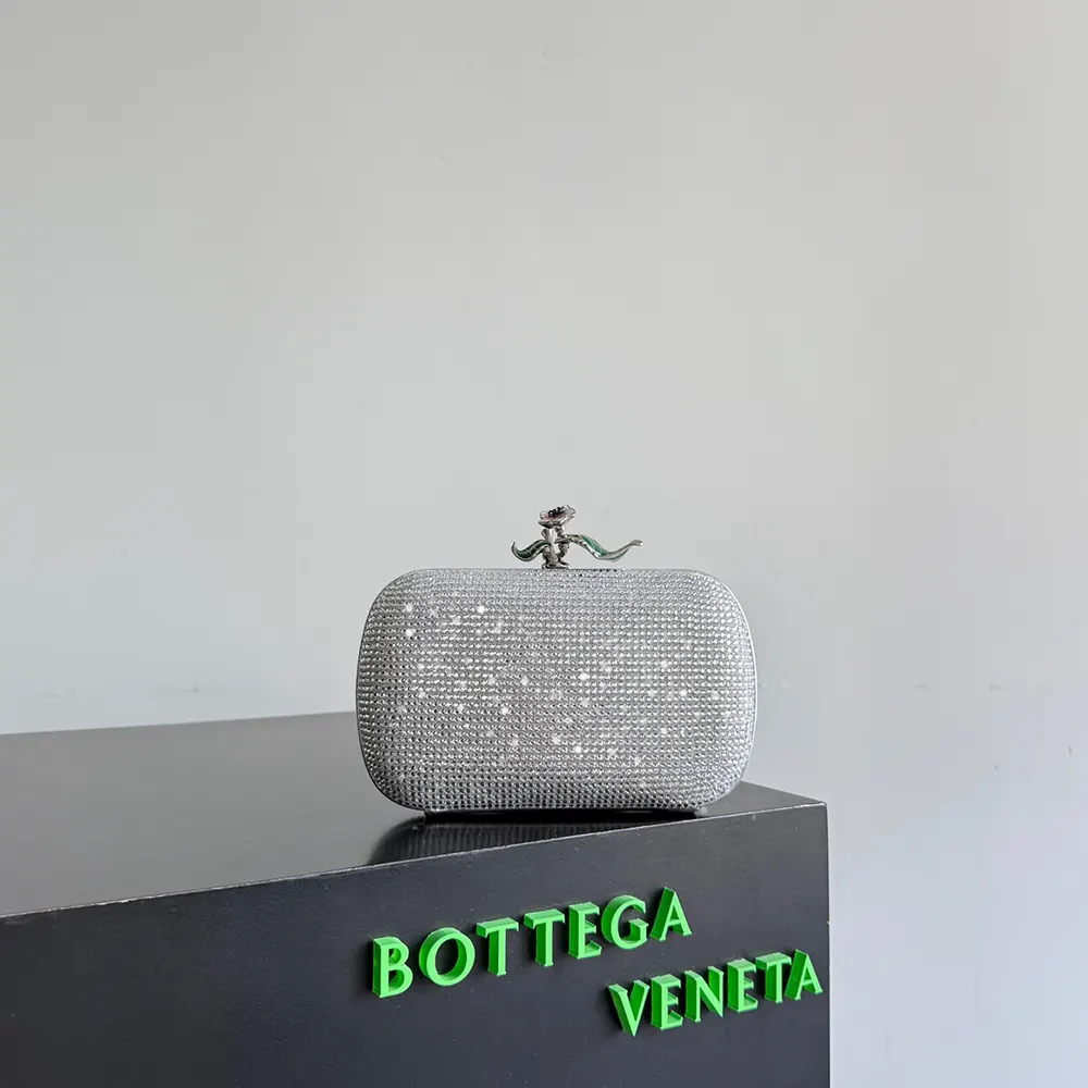 Close-up of silver intrecciato leather and hardware on Bottega Veneta Women Knot-Silver