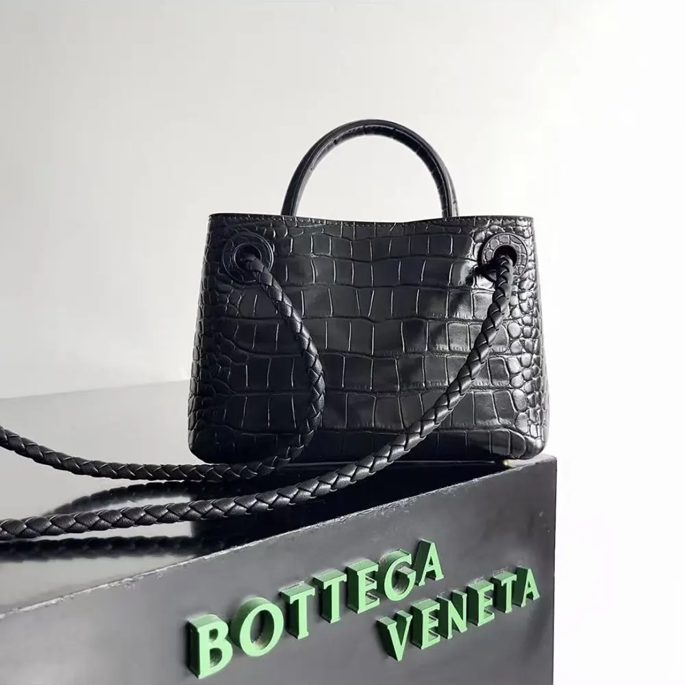 Close-up of black crocodile leather texture on Bottega Veneta Andiamo bag