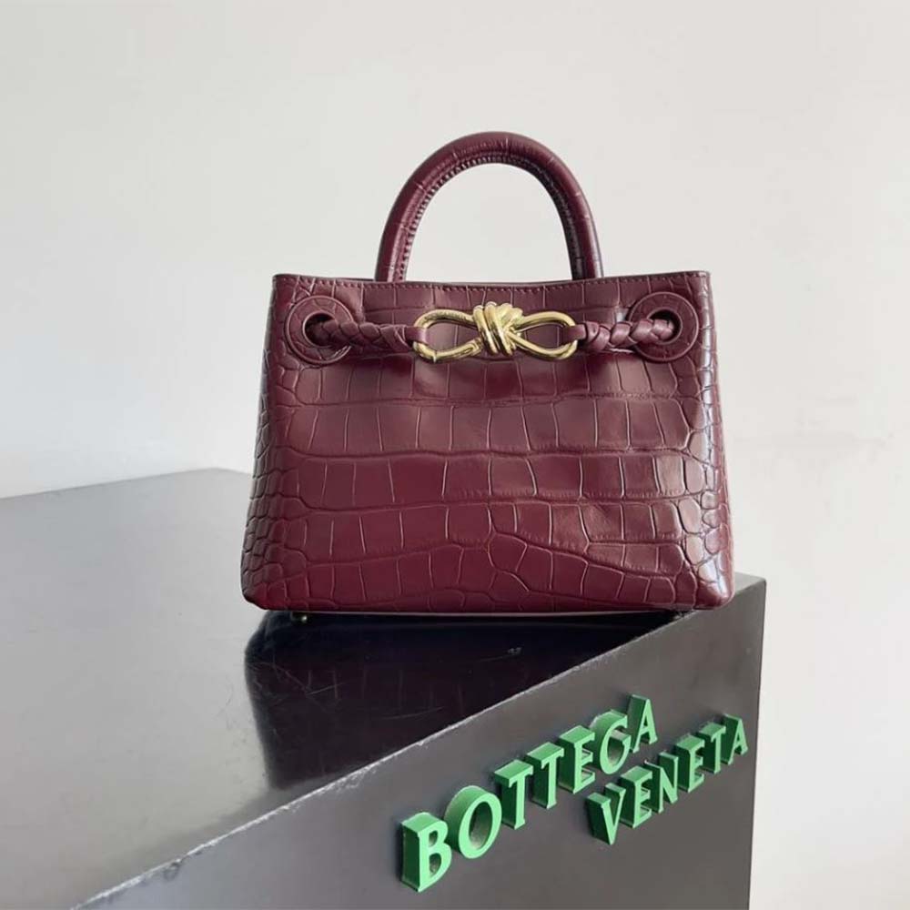 Close-up detail of red crocodile texture on Bottega Veneta Small Andiamo Bag