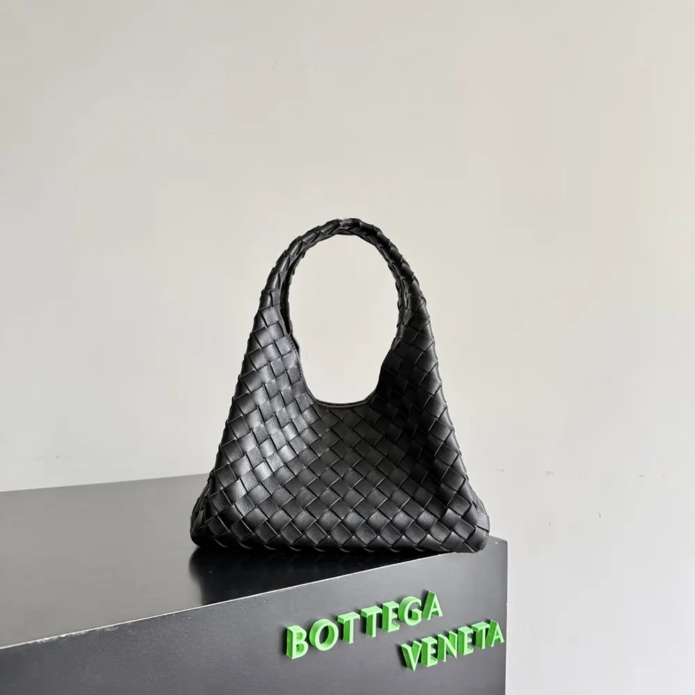 Close-up of brushed gold hardware and zip on Bottega Veneta Women Small Campana-Black