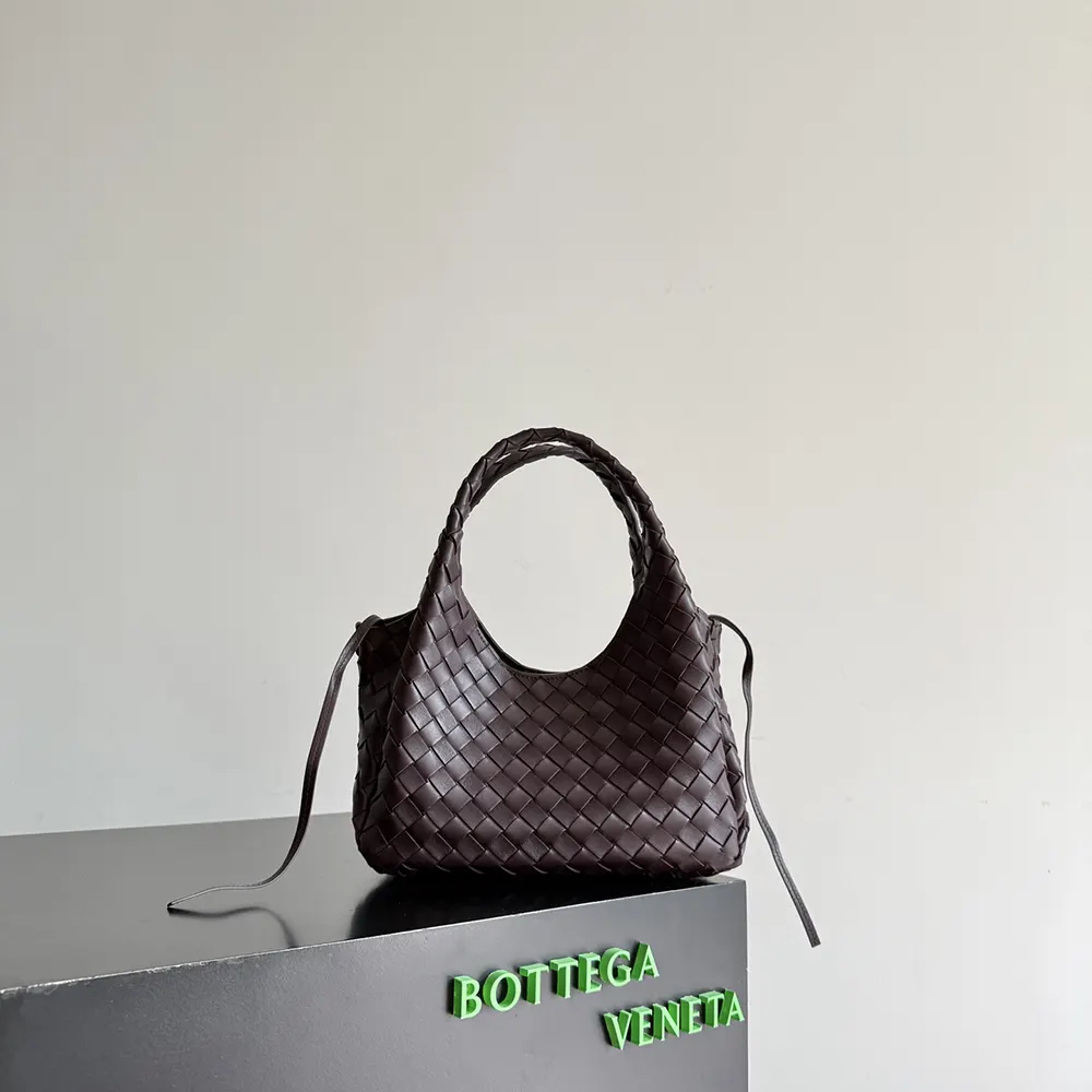 Side profile showcasing matte gold hardware on Bottega Veneta Campana-Bordeaux