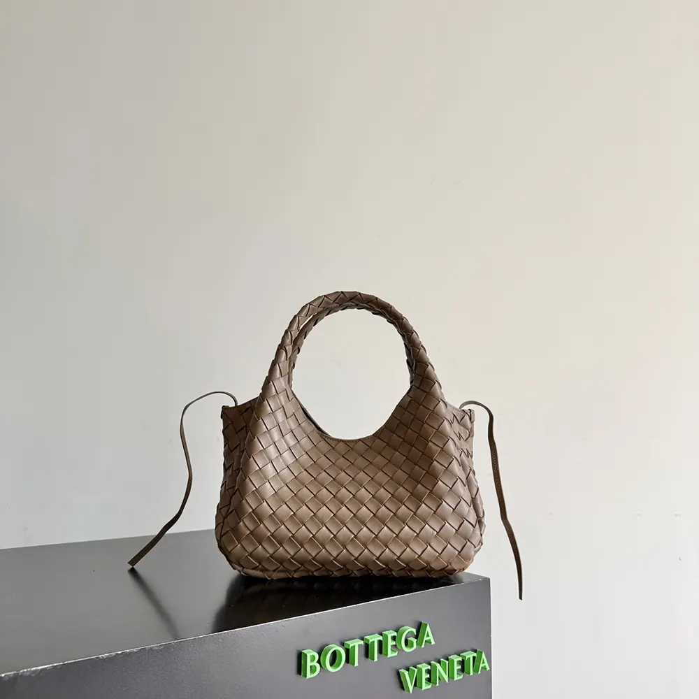 Side angle showing gold hardware on Bottega Veneta Small Campana-Chocolate
