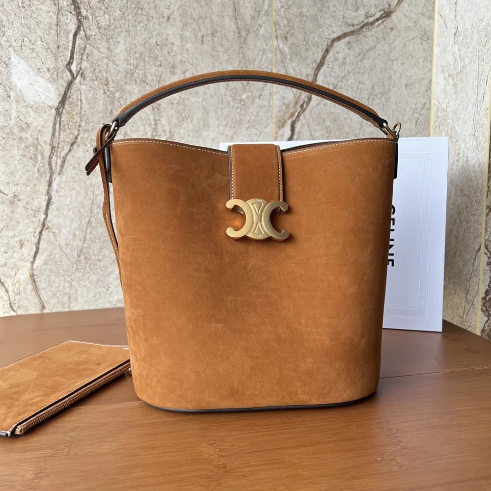 Side angle showcasing silhouette of Celine Women Medium Louise Bag