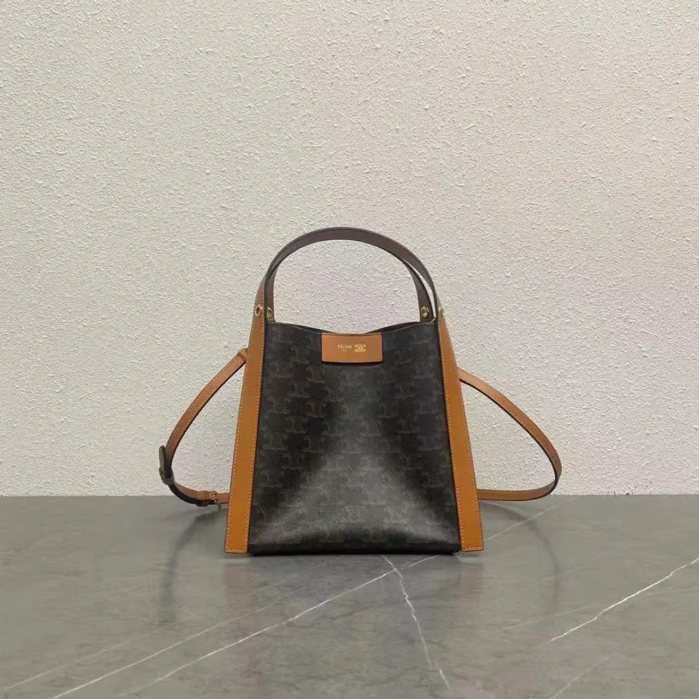 Close-up of gold hardware and natural calfskin detail on Celine Small Cube Bag