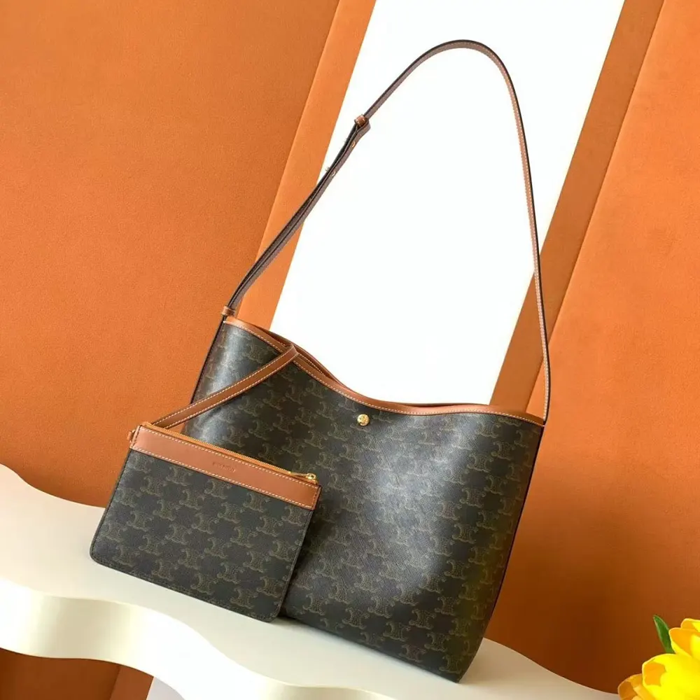 Close-up of gold-tone hardware and calfskin trim on Celine Soft Shopper Bag