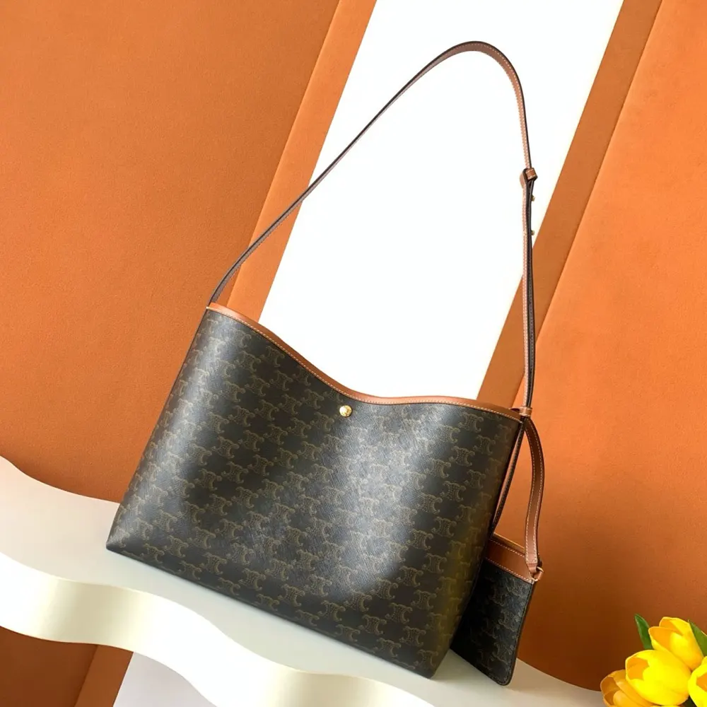 Side view showing spacious silhouette of Celine Women Soft Shopper Bag