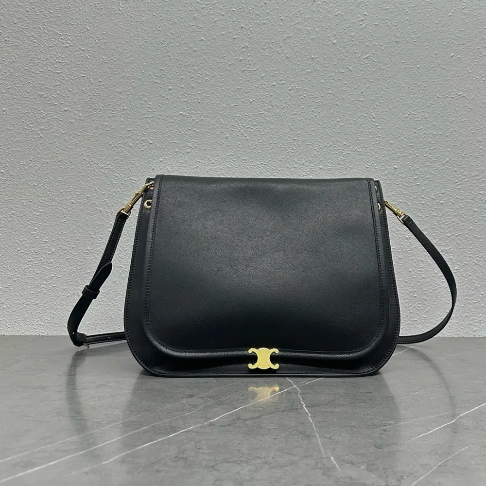 Close-up of gold Triomphe clasp on Celine Women Soft Triomphe Besace