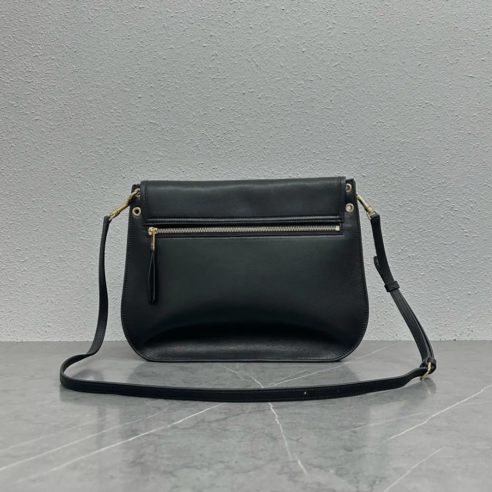 Side angle showing sleek silhouette of Celine Women Soft Triomphe Besace black