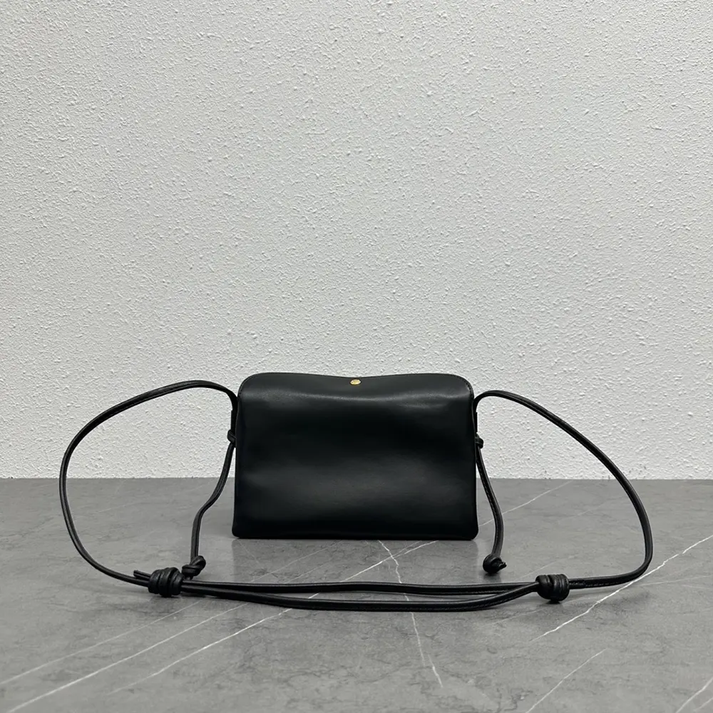 Side angle of Celine Women Trio Flap In Smooth Lambskin-Black shoulder bag