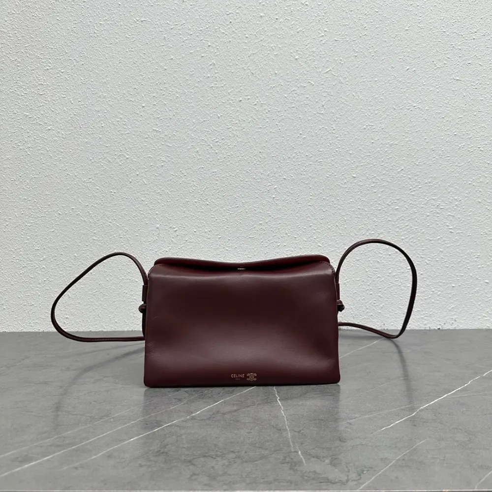 Close-up of gold hardware and smooth lambskin on Celine Women Trio Flap