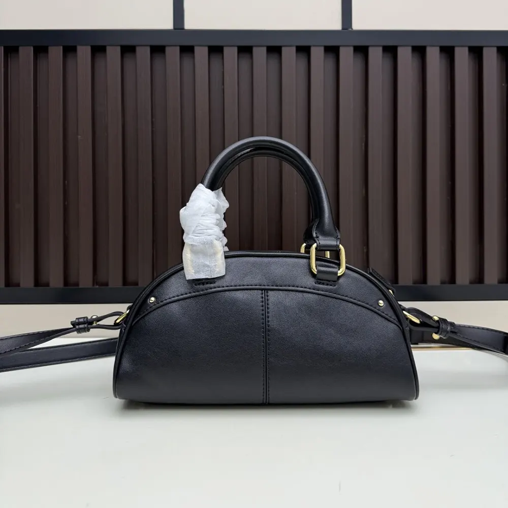 Side profile showing soft leather texture of Chloe Women Small Chloé Bowling Bag