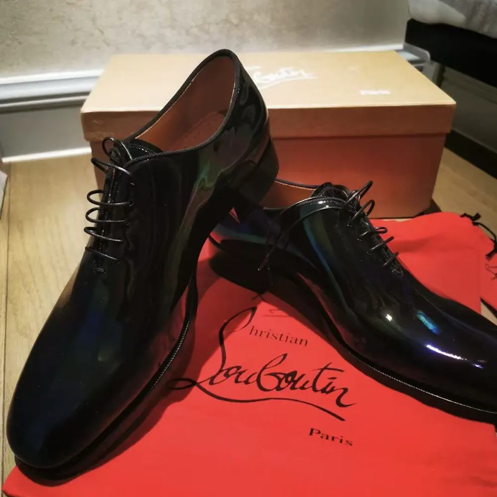 Detail of signature red sole on Christian Louboutin Men Pelvis Oxfords