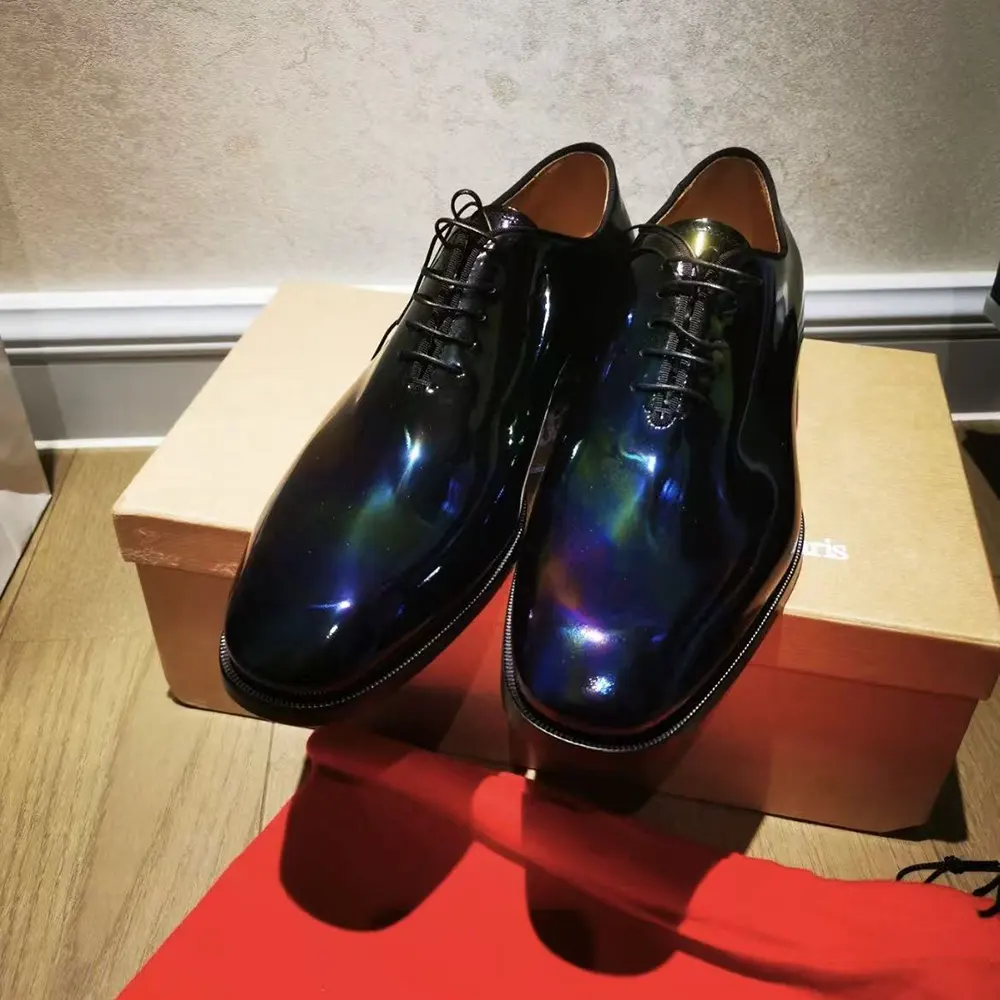 Close-up of glossy patent calf leather on Christian Louboutin Men Pelvis Oxfords