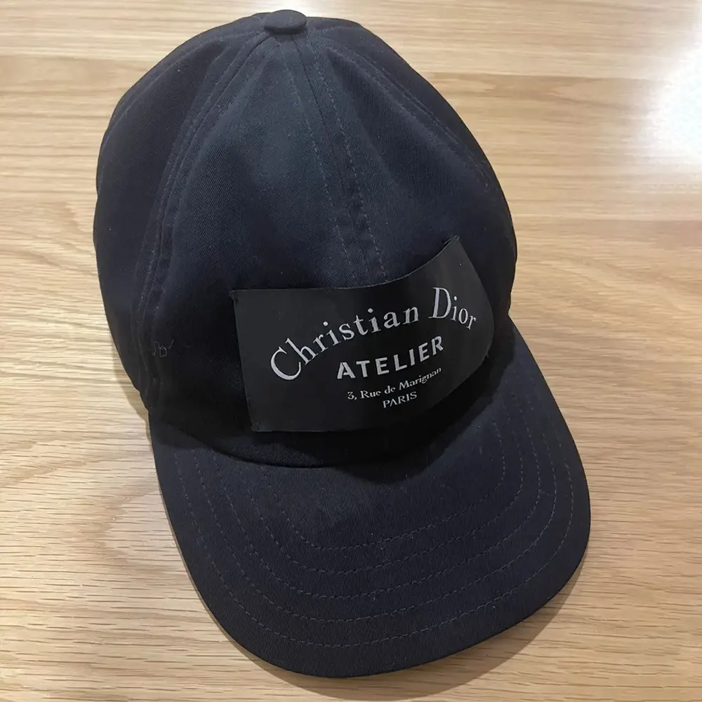 Close-up on embroidered centered logo of Dior Unisex Cap