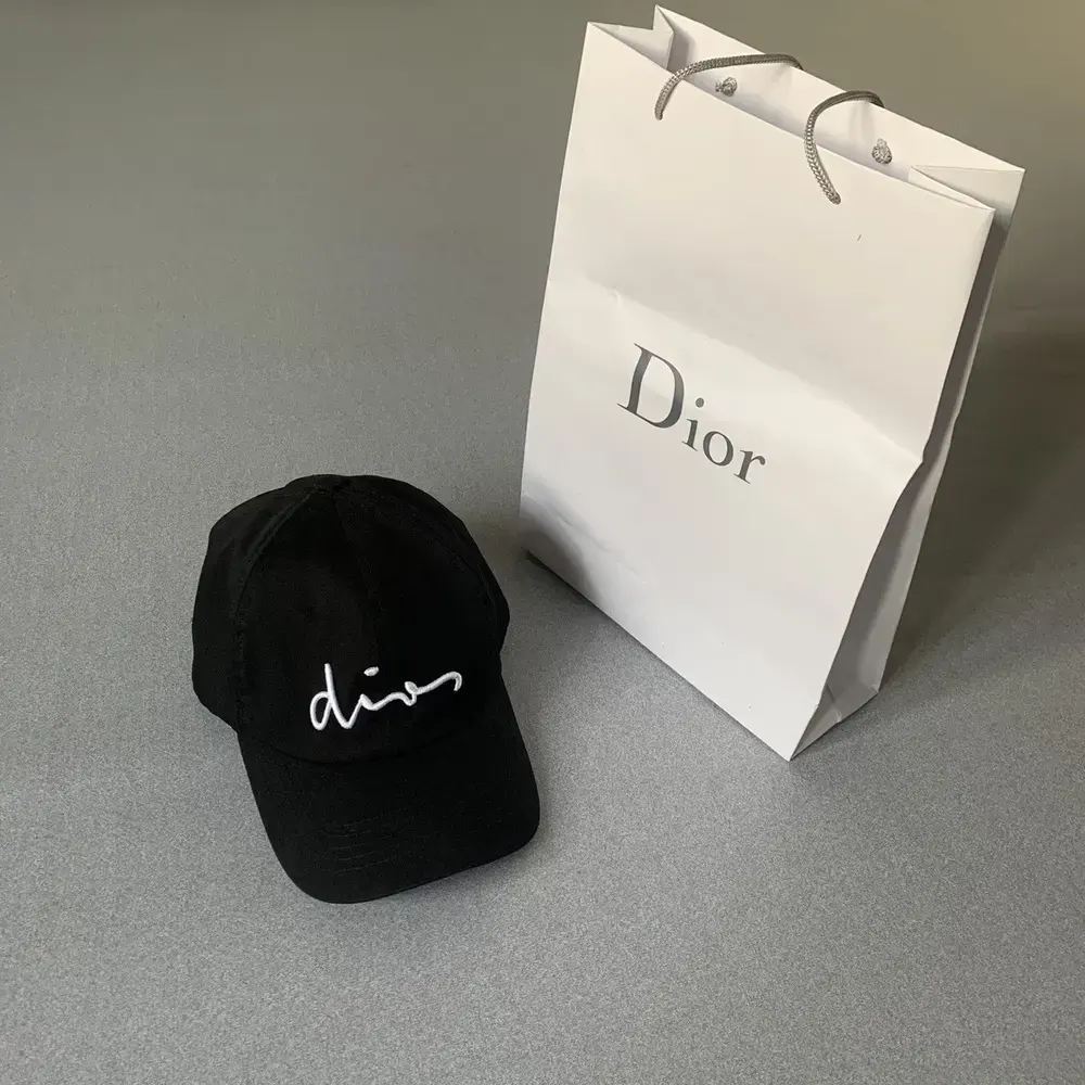 Close-up of black cotton canvas and adjustable strap on Dior Unisex Ribbon Cap
