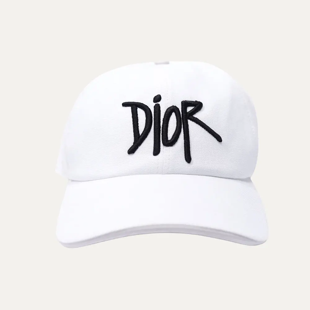 Front view of Dior Unisex Stussy Embroidered Logo Hat White Cotton Canvas