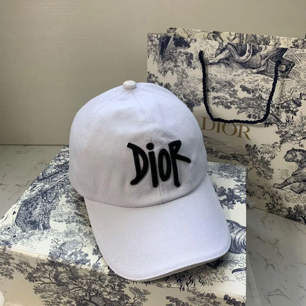 Side angle showing adjustable strap on Dior Unisex Stussy Embroidered Logo Hat