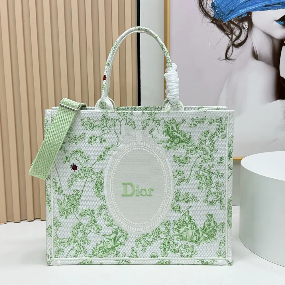 Close-up of multicolor clover embroidery on Dior Book Tote fabric