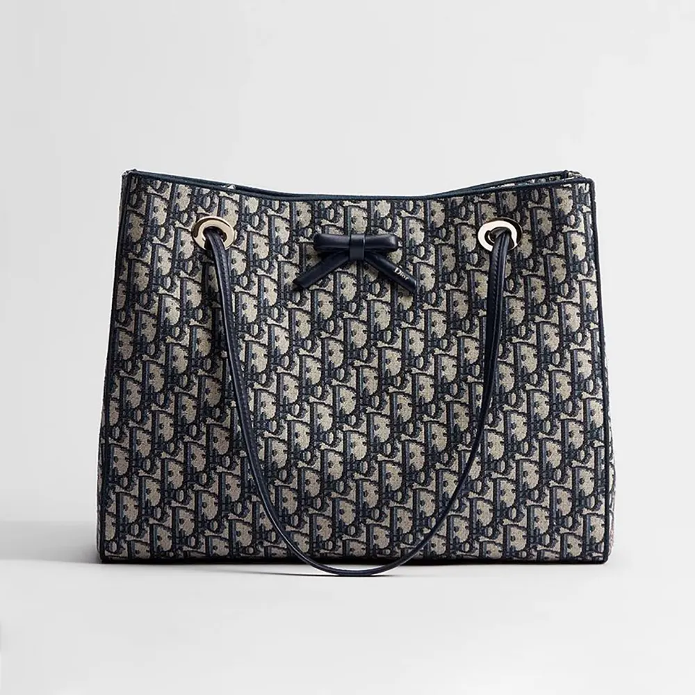 Front view of Dior Women Medium Shopping Bag Blue Dior Oblique Jacquard