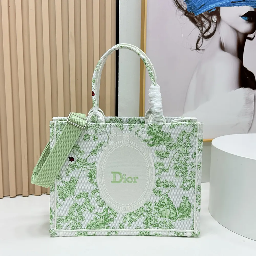 Close-up of green Toile de Jouy clover print and silver hardware details