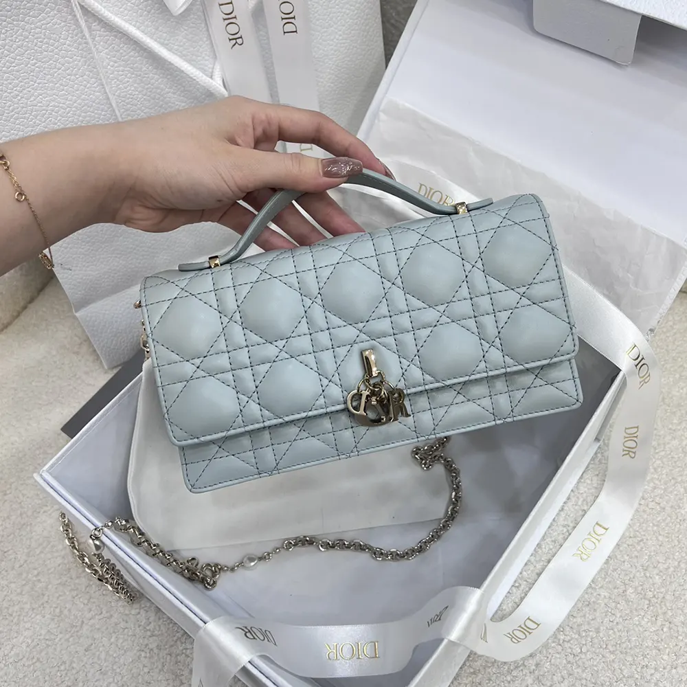 Side angle showing adjustable strap and lambskin texture
