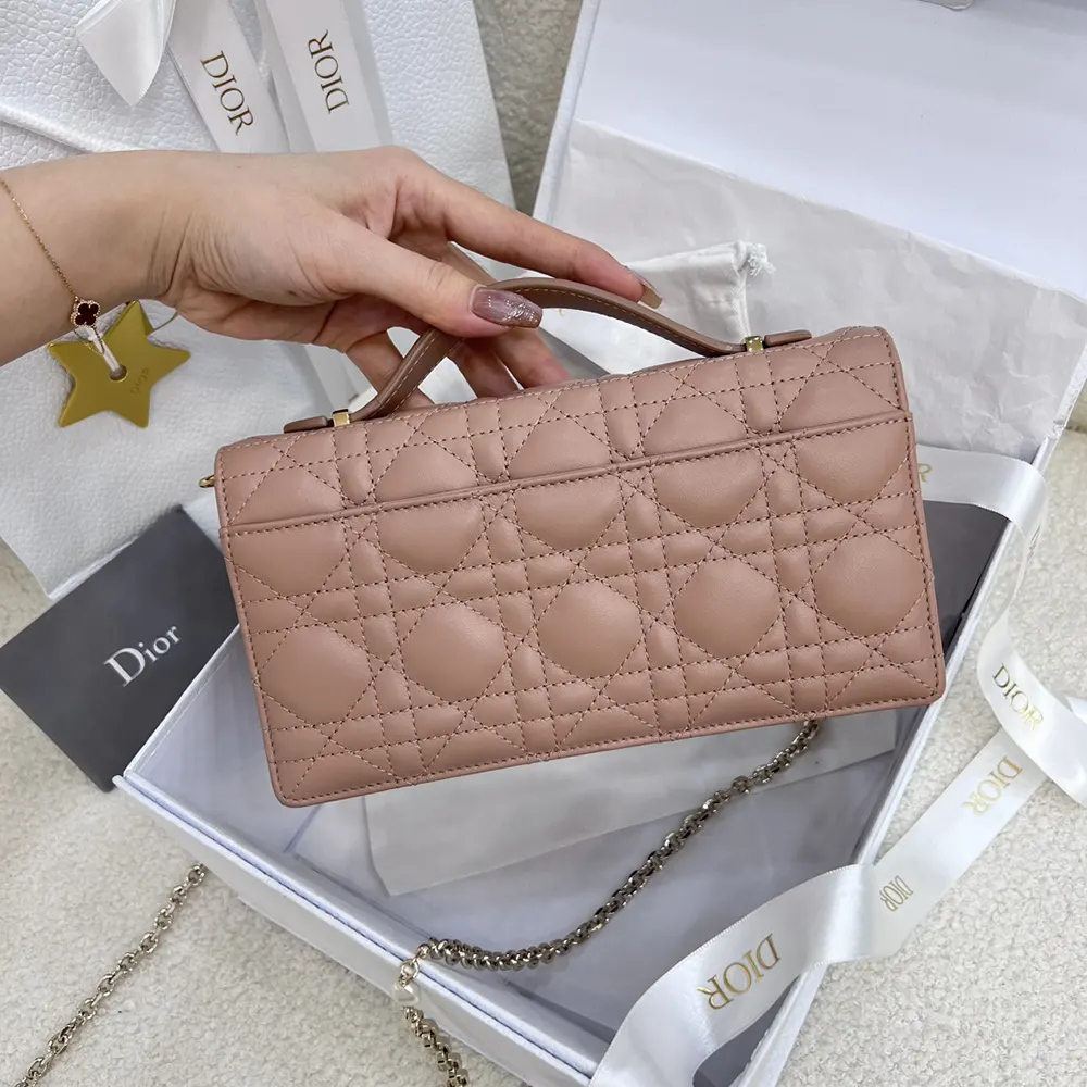 Side angle showing soft pink lambskin and Cannage quilting details