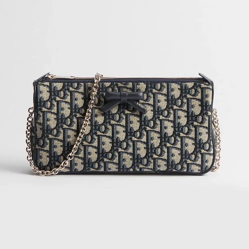 Front view of Dior Women Oblique Bow Pouch with Chain in blue jacquard
