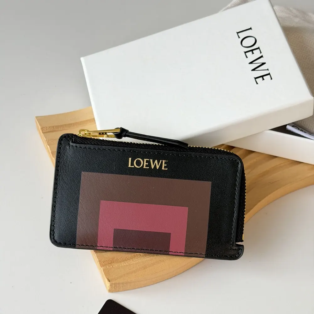 Close-up of embossed Loewe logo on black nappa calfskin cardholder