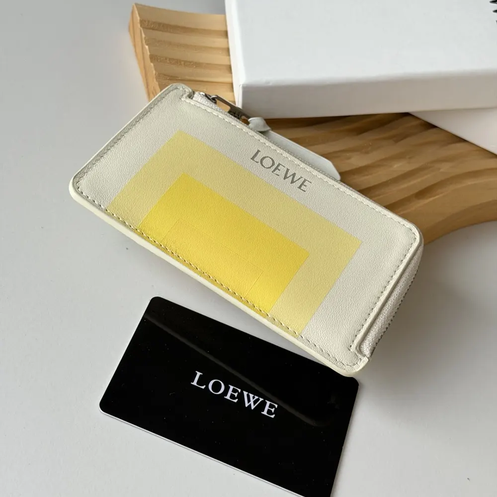 Side profile showing slim silhouette of Loewe Unisex Coin Cardholder