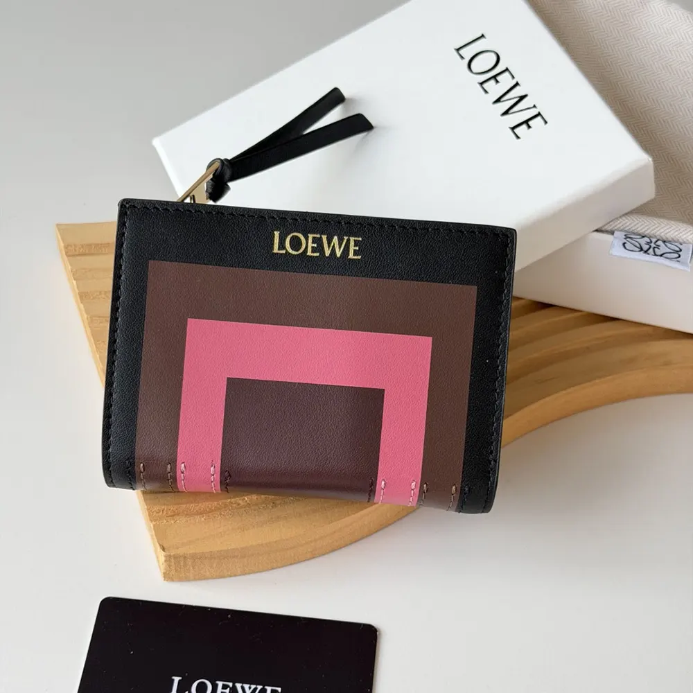 Close-up of silver-tone hardware on Loewe Unisex Compact Wallet