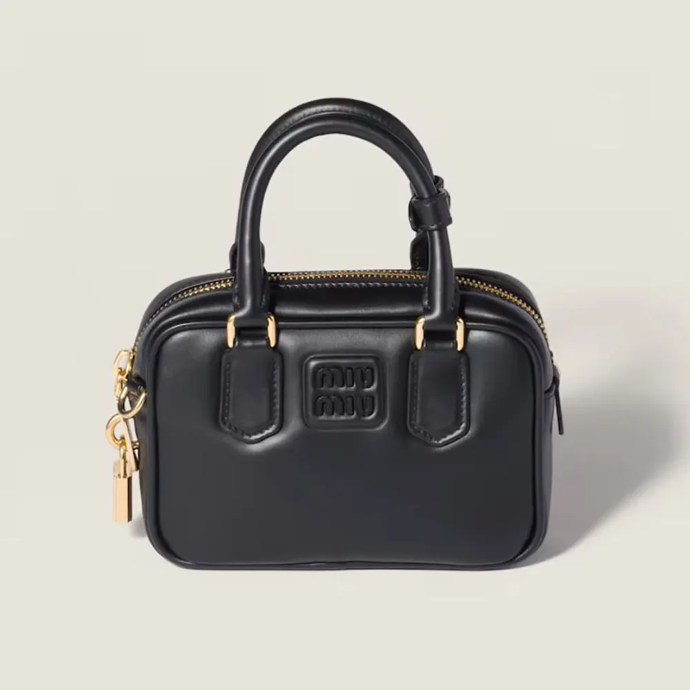 Front view of Miu Miu Women Arcadie Leather Bag-Black showcasing quilted leather