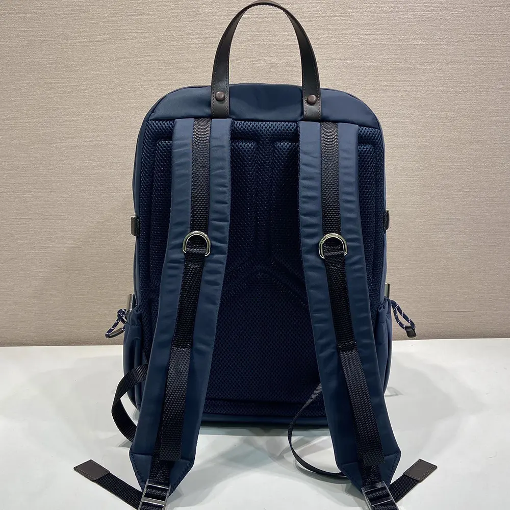 Side profile showing silhouette and adjustable straps of Prada Speedrock backpack