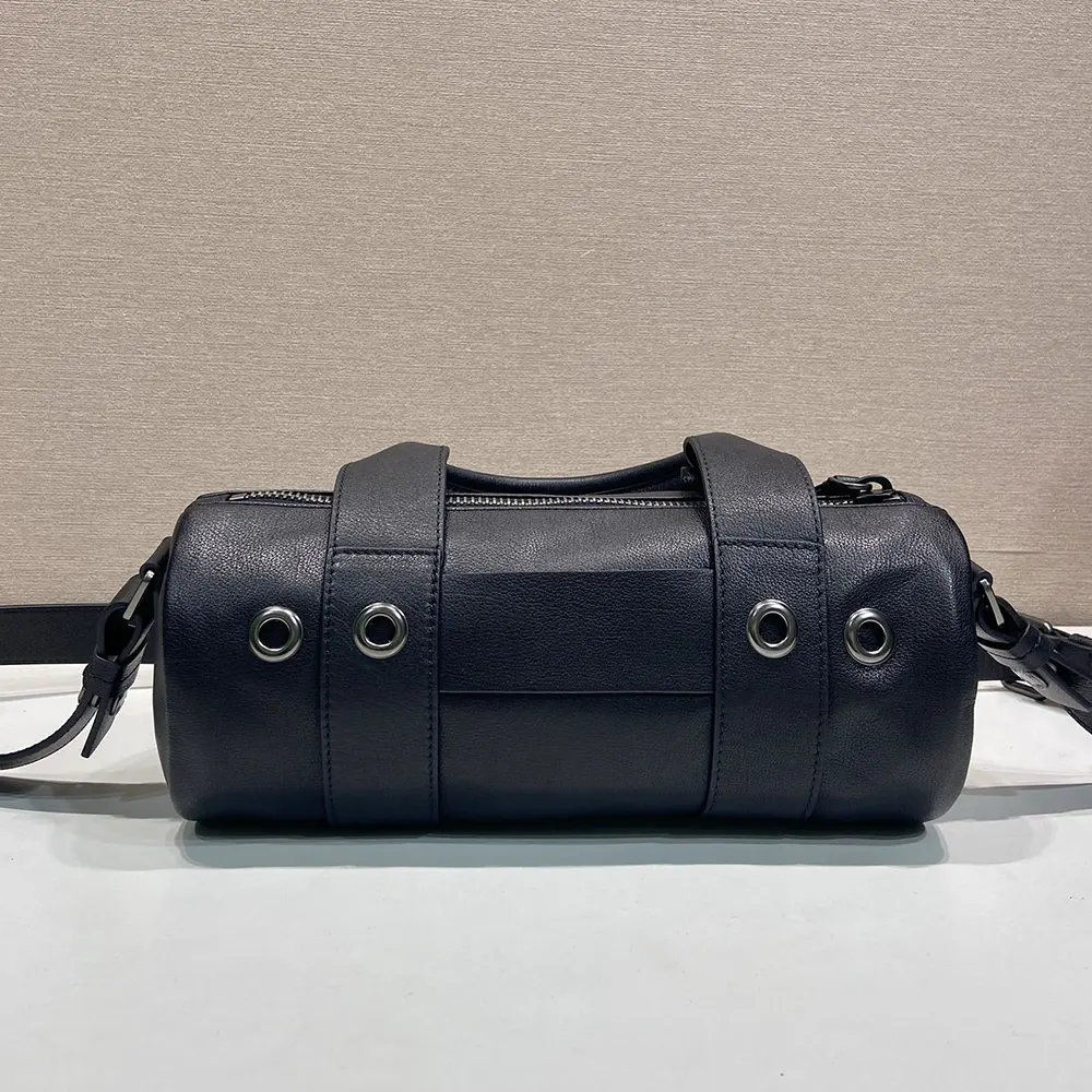 Side angle showcasing silhouette of Prada Women Route Large Leather Bag