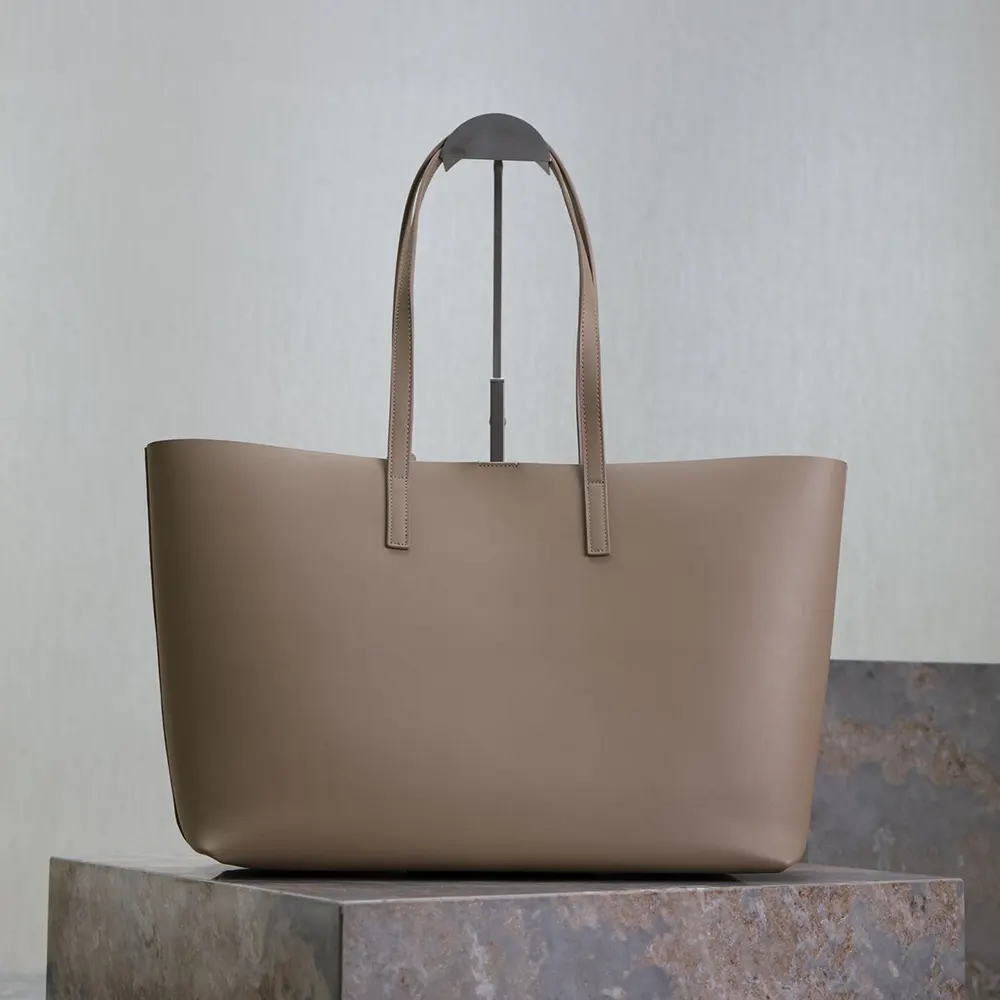 Side profile showing slim silhouette of Saint Laurent YSL Women Shopping handbag