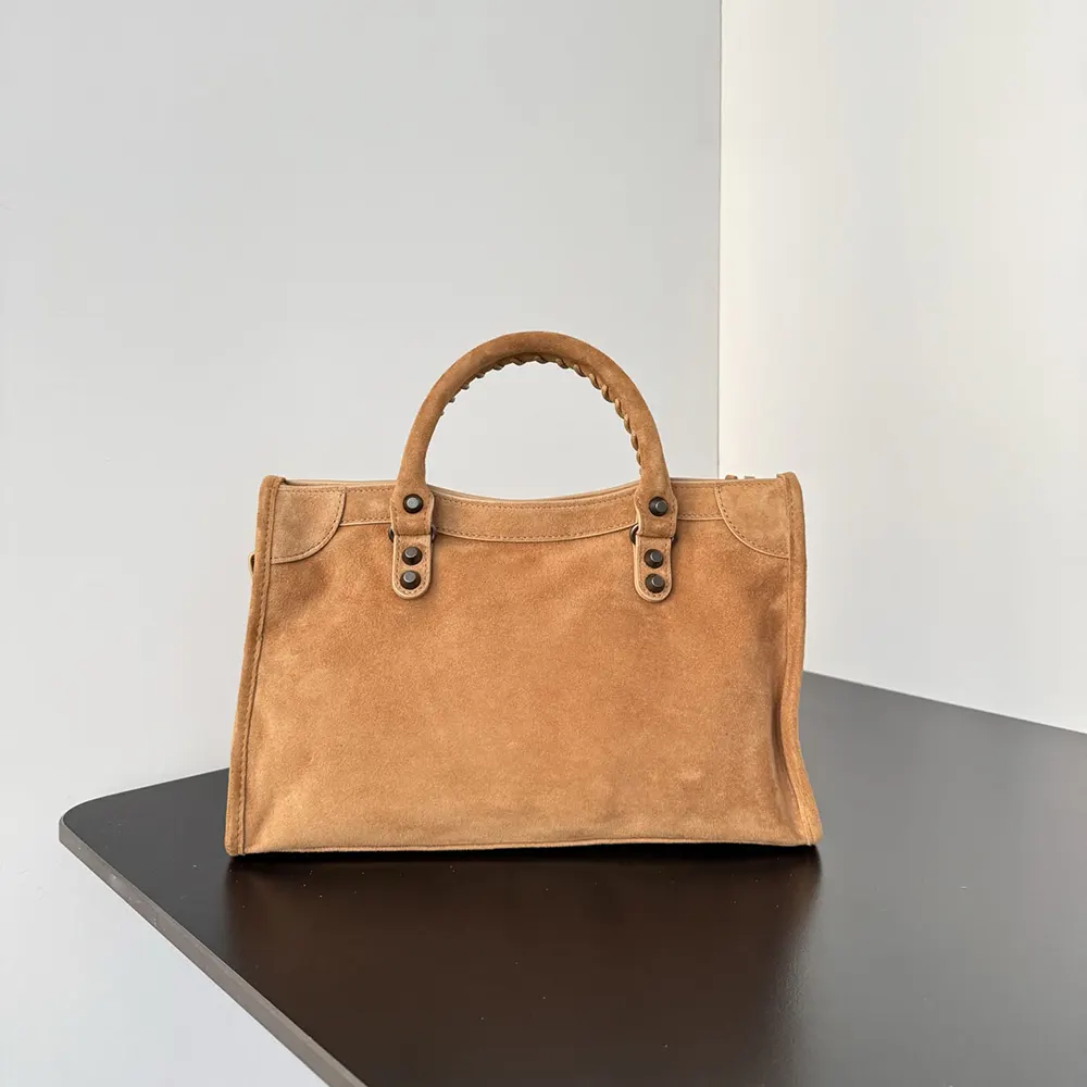 Side view showing compact silhouette of Balenciaga Women Le City Bag Small