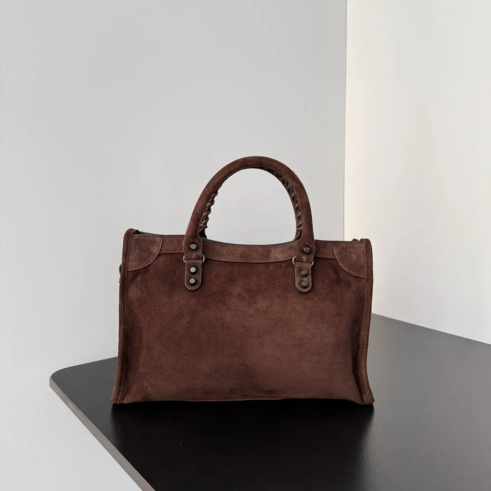 Side profile showing compact silhouette of Balenciaga Women Le City Bag Small